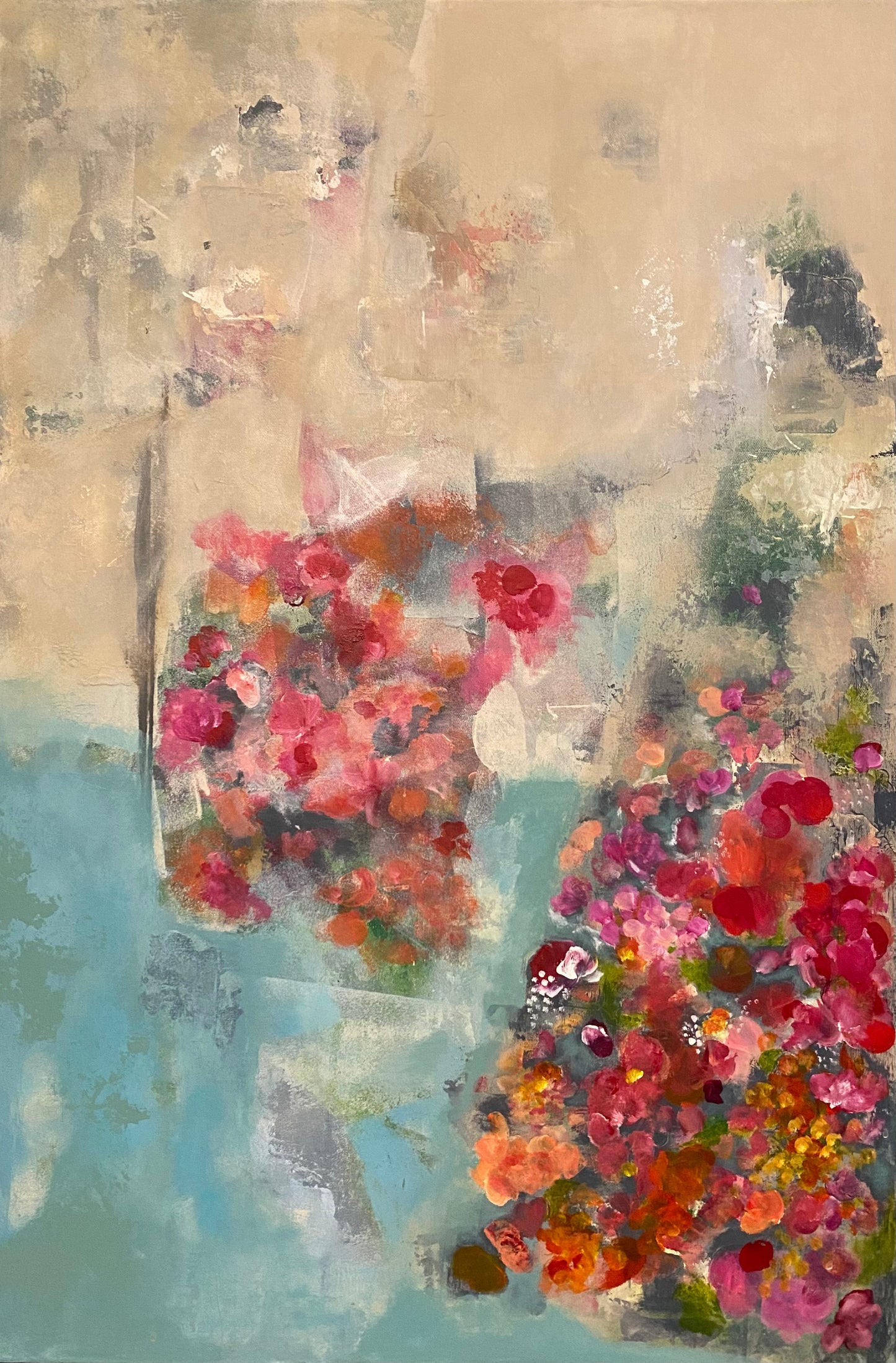 A canvas abstract impressionistic painting featuring multicolored flowers.