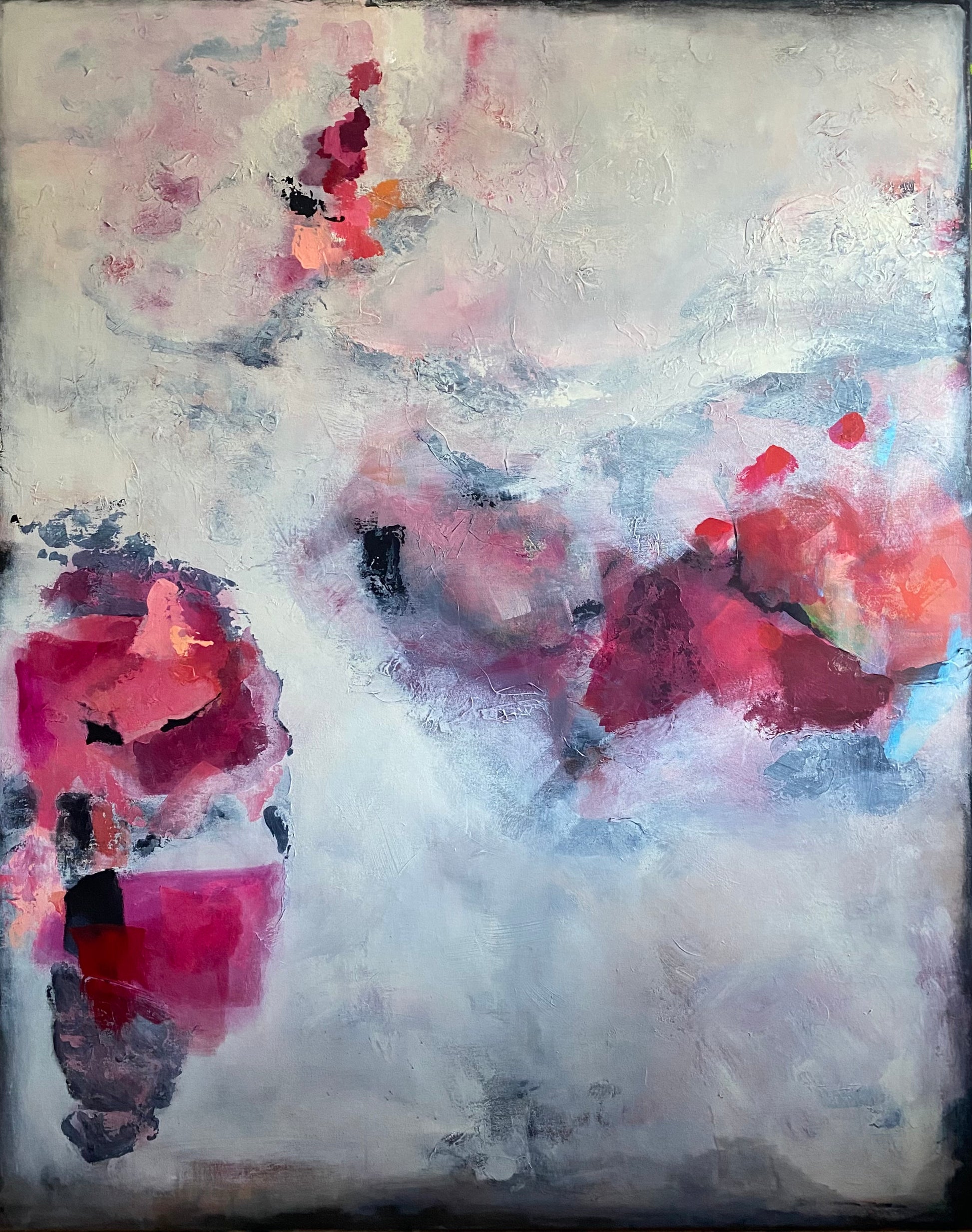 Abstract art piece with pink and red floral elements on a textured background